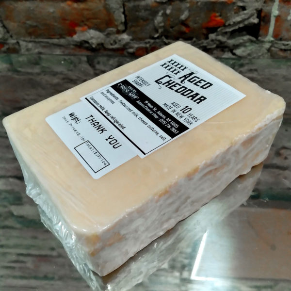 A block of 10X NY Cheddar cheese.