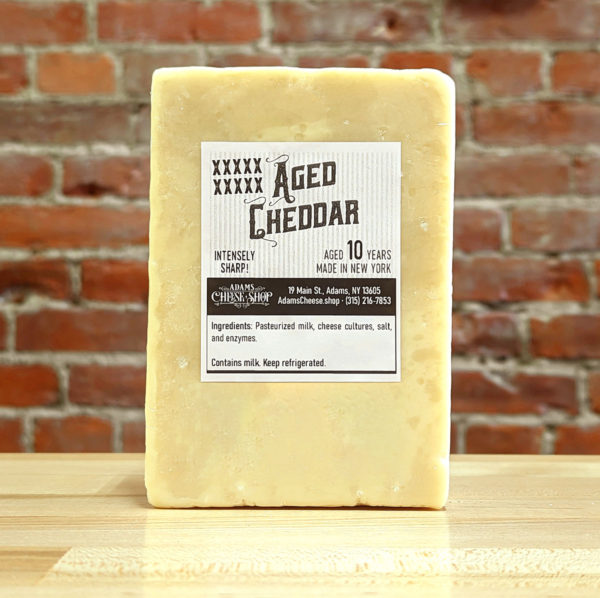 A block of 10X NY cheddar cheese.
