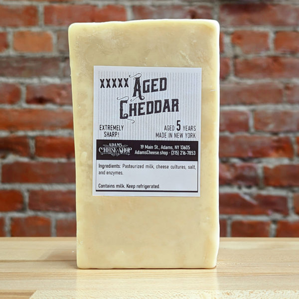 A block of 5X-sharp aged NY cheddar cheese.