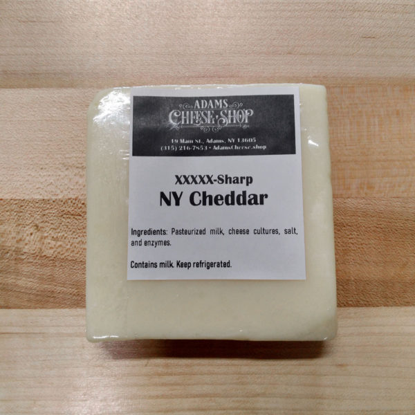 Block of 5X-sharp aged NY Cheddar cheese.