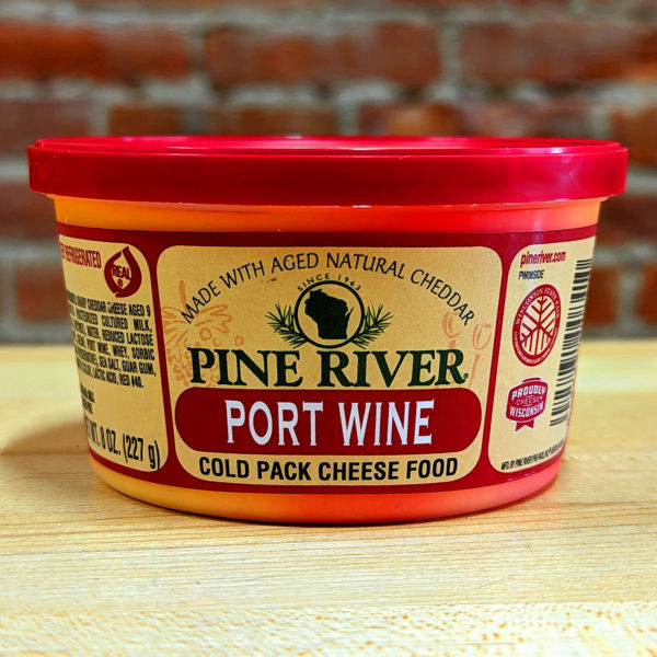 A tub of Port Wine cheese spread.