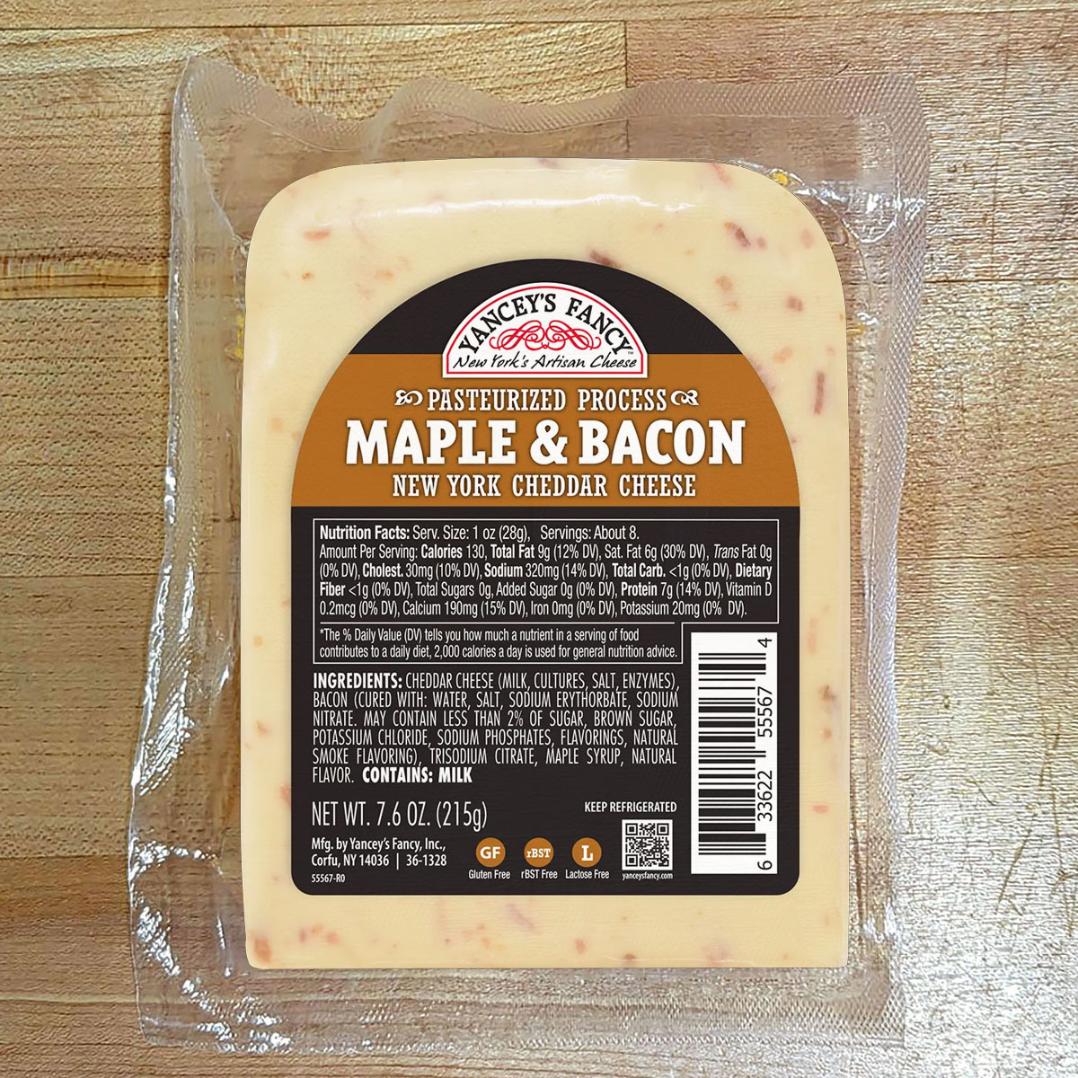 A wedge of Maple & Bacon Cheddar Cheese.
