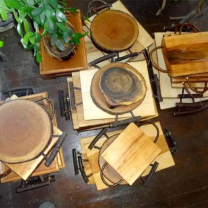 An assortment of rustic, wooden cutting boards.