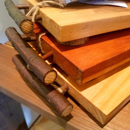 Assorted rustic wooden cheese boards.