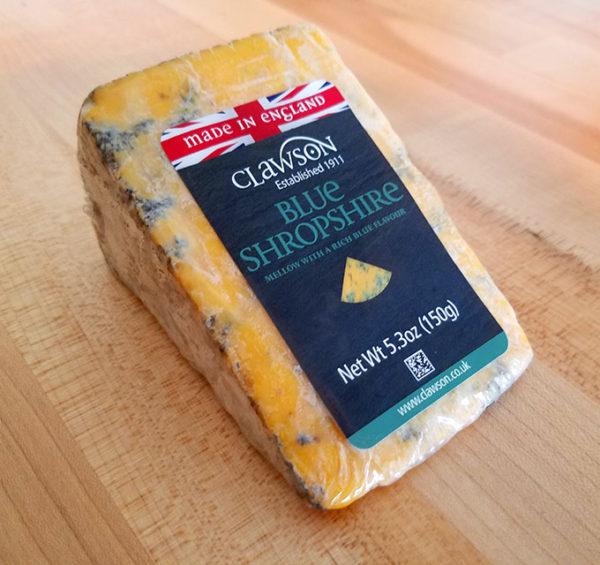 A sealed wedge of Shropshire Blue cheese.