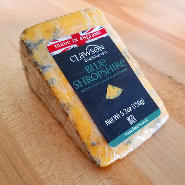 A sealed wedge of Shropshire Blue cheese.