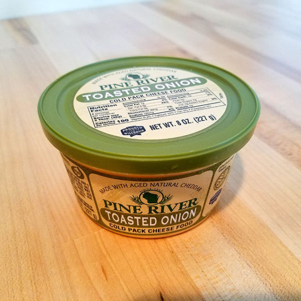 A container of Pine River Toasted Onion Cheese Spread.