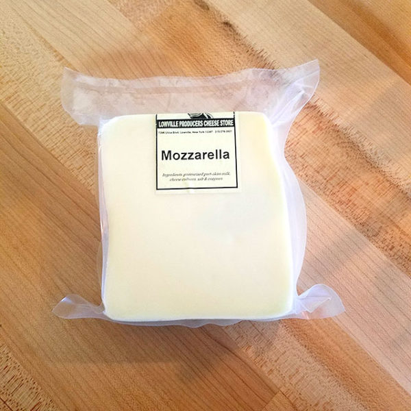 A brick of Mozzarella cheese.