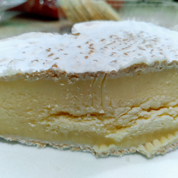 Closeup of the paste of Coeur de Bray Neufchatel cheese.