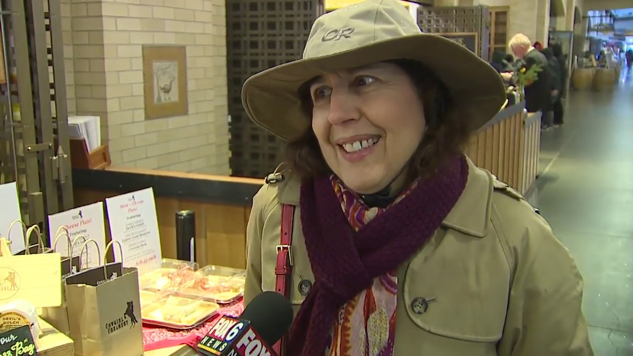 A woman in San Francisco being interviewed about cheese curd.