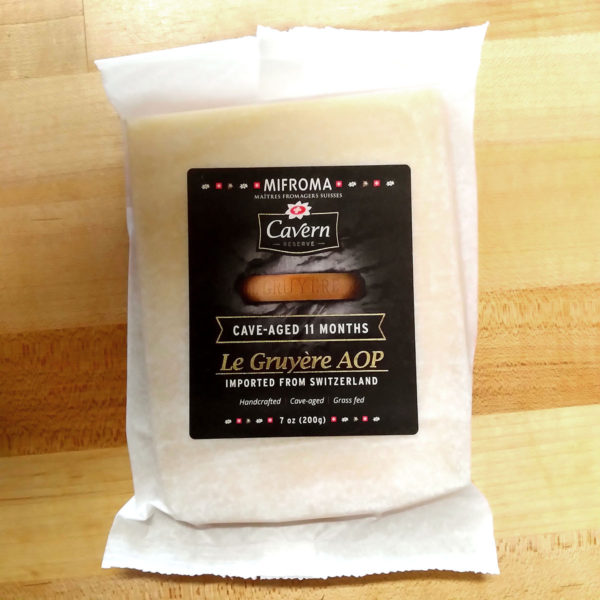 A wedge of Cavern Reserve Swiss Cave-Aged Le Gruyère AOP.