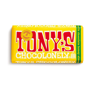 A bar of Tony's Chocolonely Milk Honey Almond Nougat chocolate bar.