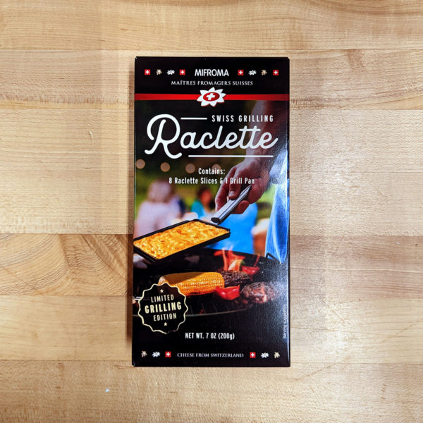 Box of limited edition Raclette Swiss Grilling Cheese.