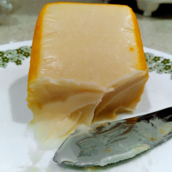 Closeup of the paste of Port Salut cheese.
