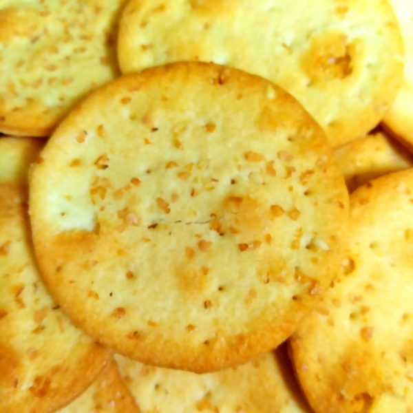 A pile of Ines Rosales Manchego Mini Tortas crackers.