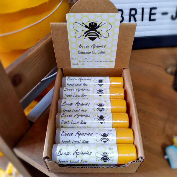 A box of Beese Apiaries Beeswax Lip Balms.