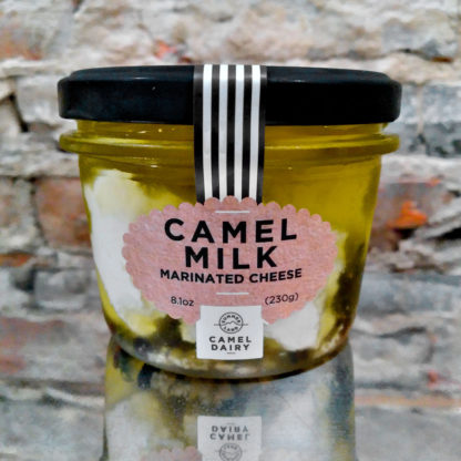 An unopened jar of Camel Milk Marinated Cheese.