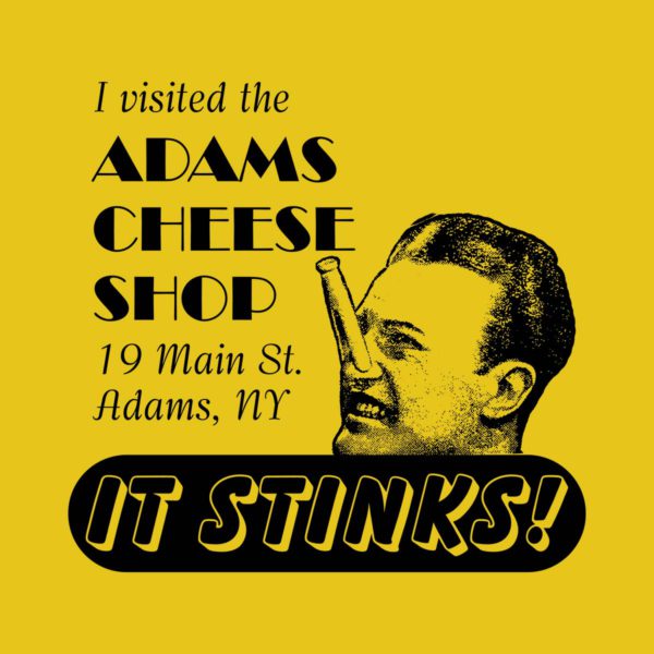 Close-up of Adams Cheese Shop "It Stinks" t-shirt design.