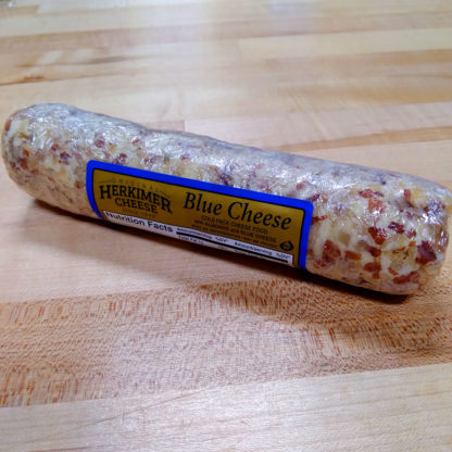 A log of Blue Cheese spread, with crushed almonds.