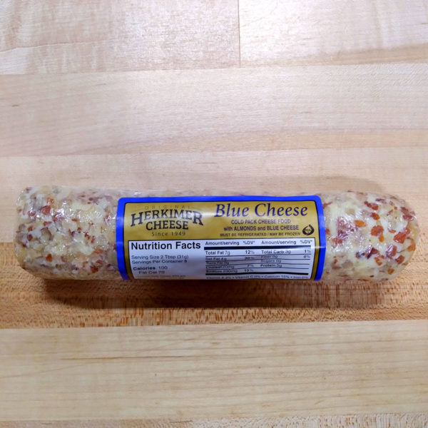 An alternate view of a log of Blue Cheese spread, with crushed almonds.