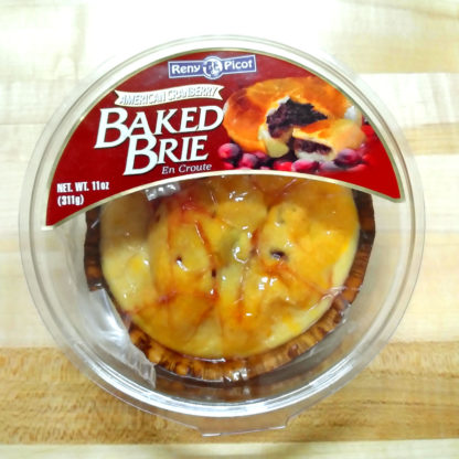 Reny Picot baked Brie in a plastic container.