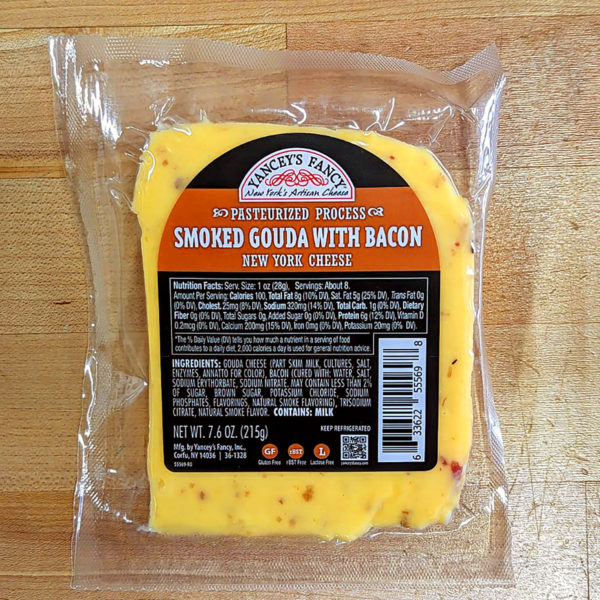 A wedge of Smoked Gouda with Bacon cheese.