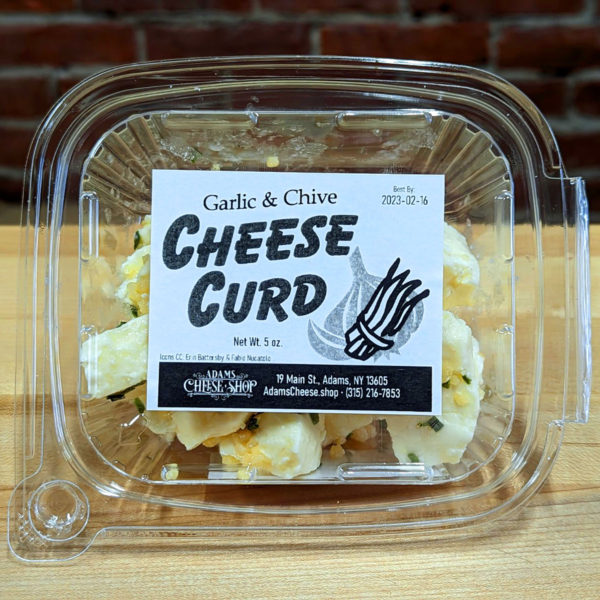 A container of Garlic & Chive Cheese Curd.