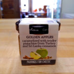 Front view of a jar of Just for Cheese, Golden Apple Spread.