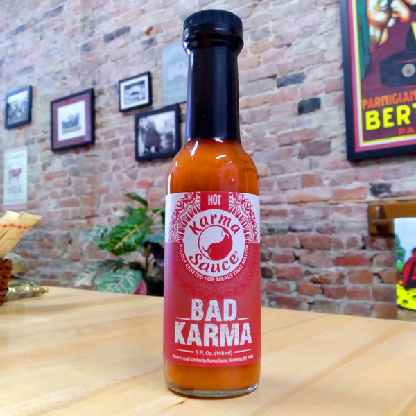 A bottle of Bad Karma hot sauce.