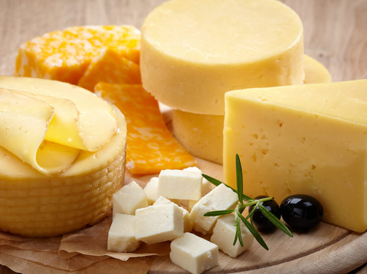 A platter featuring a variety og cheeses.