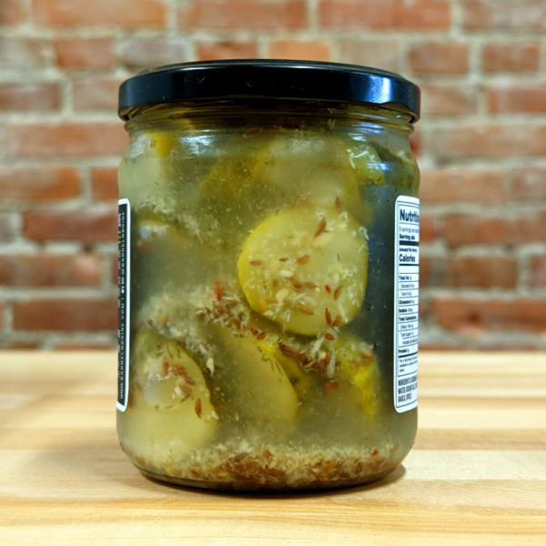 Rear view of Horseradish Dill Pickles jar, showing contents.
