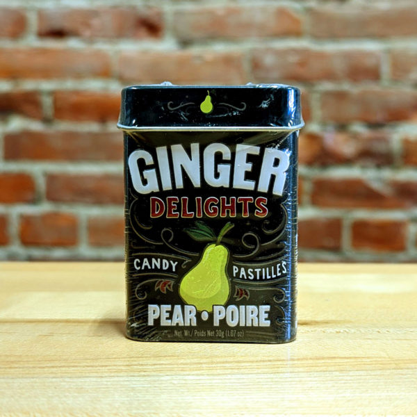 The front of a tin of Pear Ginger Delights candy.