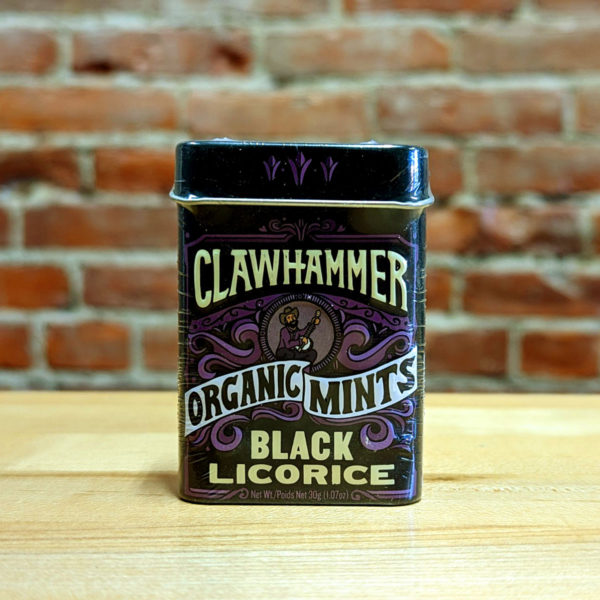 The front of a tin of Black Licorice Clawhammer Organic Mints.