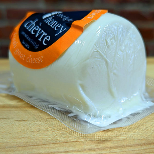 Side view of FIrst Light Honey Chevre.