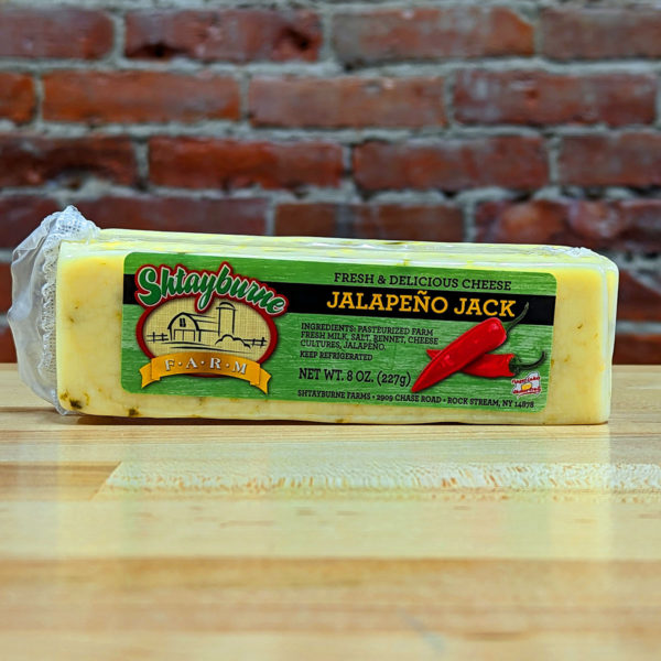 A block of Shtayburne Farm Jalapeño Jack Cheese.