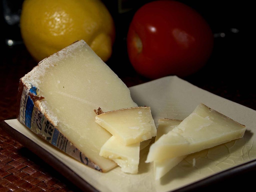 Pecorino cheese on a plate.
