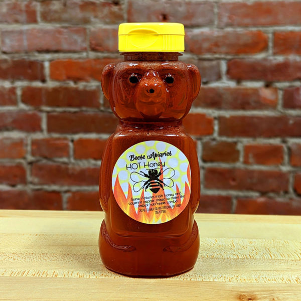 A squeeze bear bottle of Beese Apiaries hot honey.