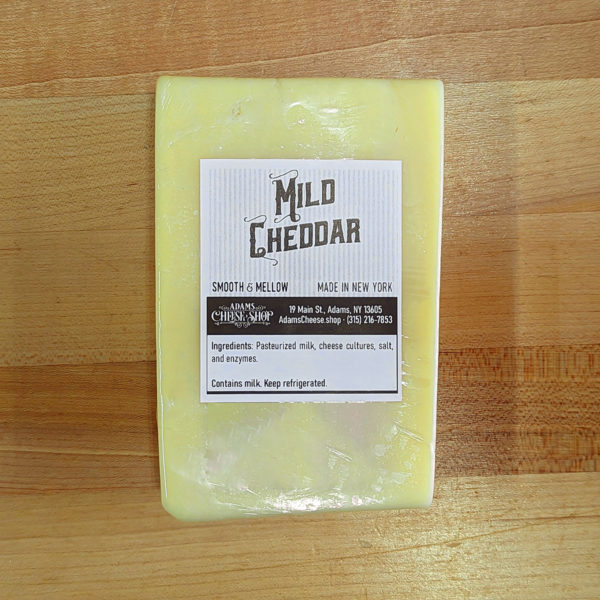 A block of Mild NY Cheddar Cheese.