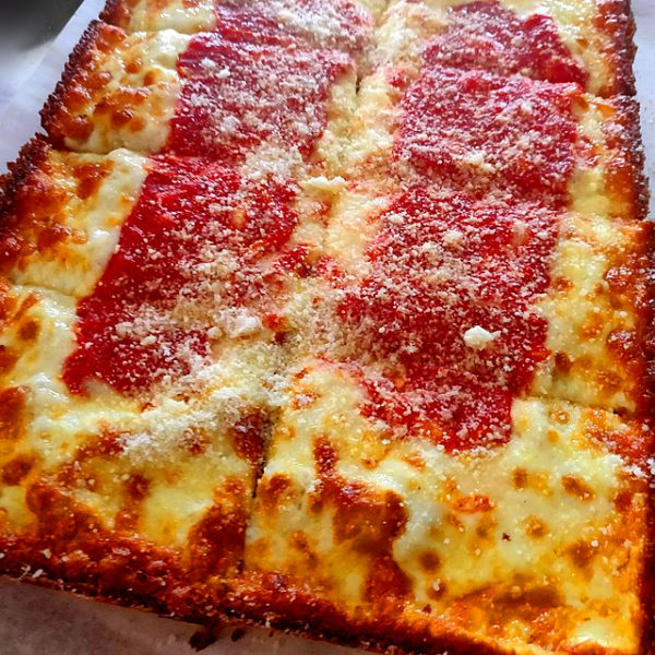 A Detroit-style pizza made with brick cheese.