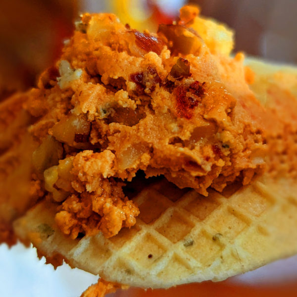 A closeup of Bandit Sharp Pimento on a cracker.