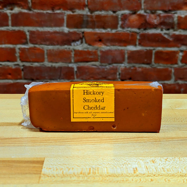 A bar of Hickory Smoked Cheddar, wrapped.