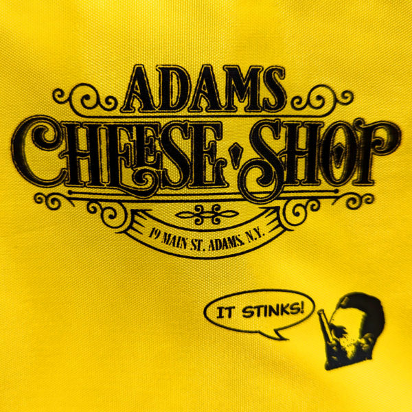 Closeup of the imprint on the Adams Cheese Shop insulated tote bag.