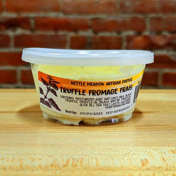 Front view of a tub of Truffle Fromage Frais.