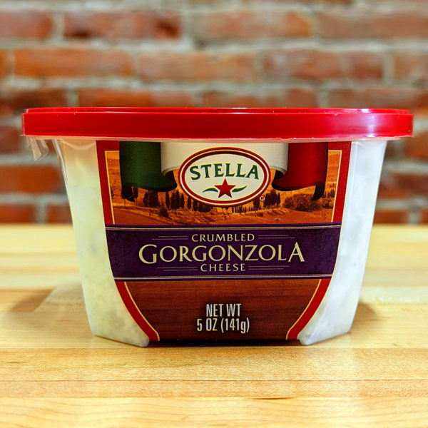 Front of a container of Stella Crumbled Gorgonzola cheese.