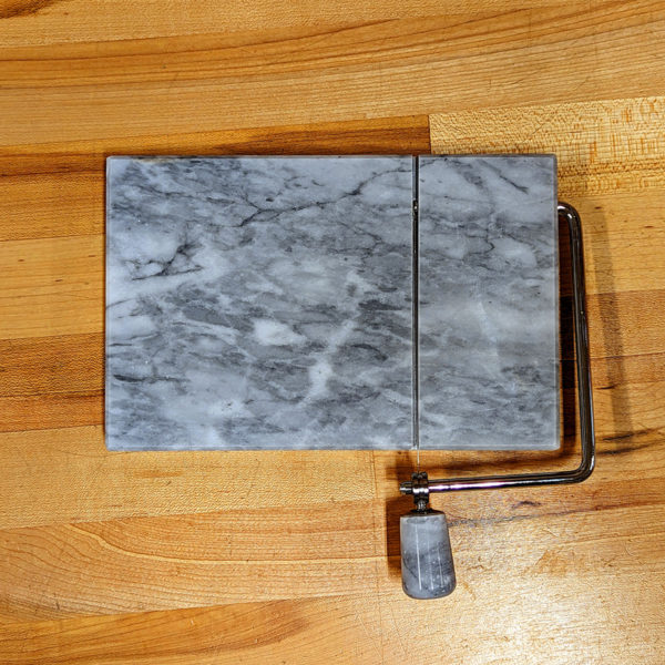 Overhead view of the White Marble Cheese Slicer.