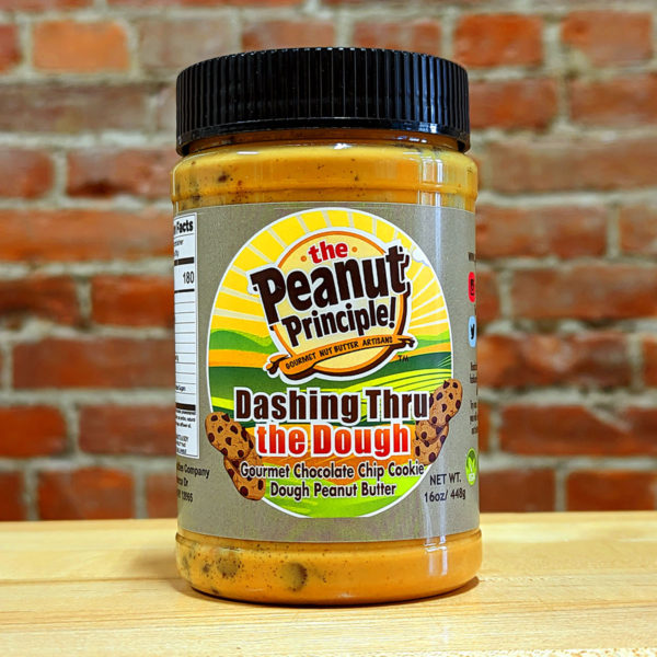 A jar of "Dashing Through the Dough" peanut butter.