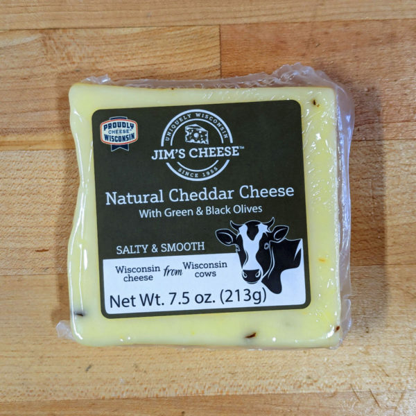 A block of Natural Cheddar Cheese with Green & Black Olives.