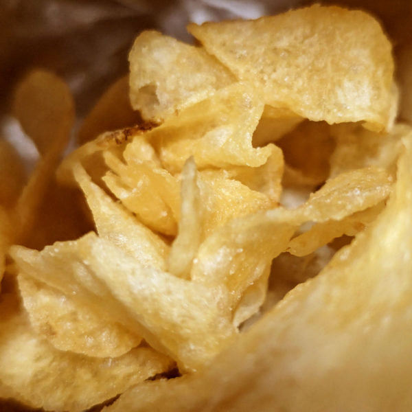 Inside of a bag of Route 11 Lightly Salted potato chip.