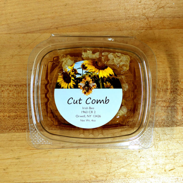 A container of cut honey comb.