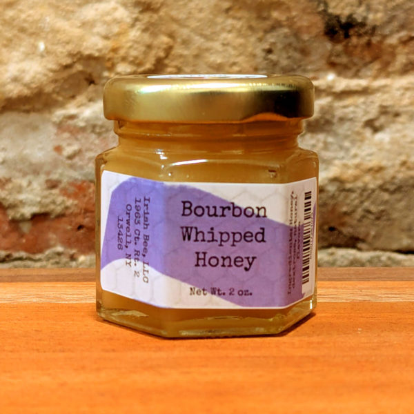 A sealed jar of Bourbon Whipped Honey.